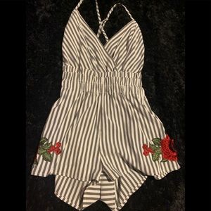 grey and white striped romper with rose details